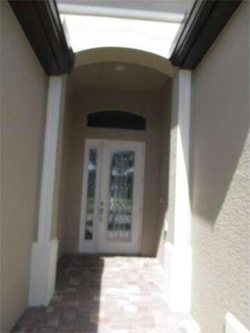Beautiful entry with decorative impact glass entry
