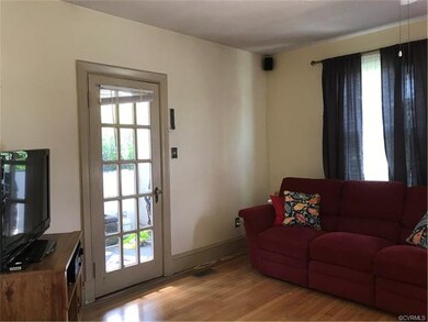 Living Room area, showing door to the sunroom.