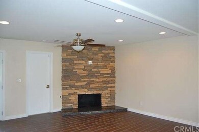 Stacked stone fireplace in the family room.