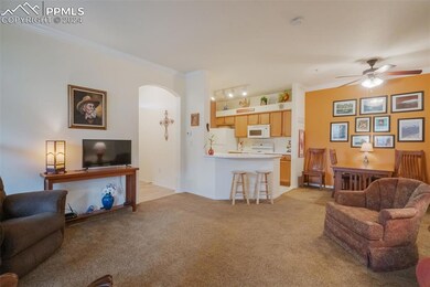 Living room with patio access and gas fireplace