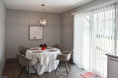 Dining room with a sliding door to the back patio.