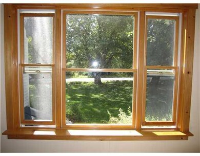 Living Room. Living Room window, to...