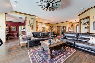 Living room with dark hardwood / wood-style floori