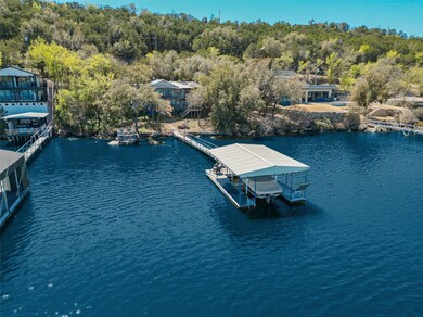 Drone / aerial view featuring a water view and a v