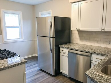 New granite countertops and tile backsplash!