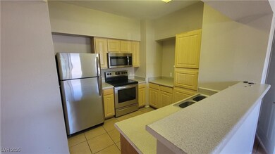 Kitchen with appliances with stainless steel finis