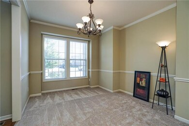 Formal dining room has new carpet