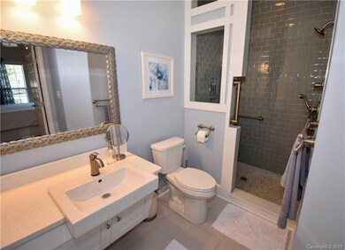 downstairs renovated master bath, also wheelchair accessible