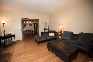 Spacious room with neutral designer colors...