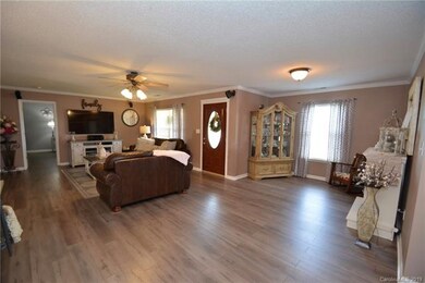 Open floorplan with large living area and adjoinin