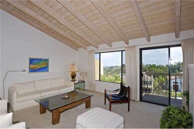 Living room with greenbelt views