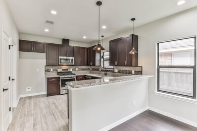 8310 Observatory St, Houston, TX 77088 - photo 7