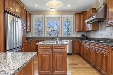 Absolutely gorgeous kitchen is a focal point of th