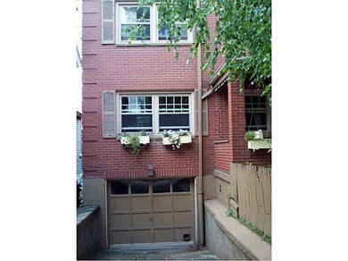 Exterior Front. ATTACHED ONE CAR GARAGE LEADS INTO