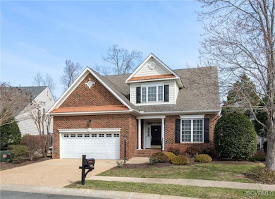 View of front facade featuring a garage
