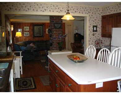 Kitchen. Or gather at the bar in the...