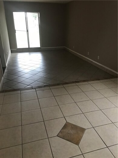 View of tiled spare room