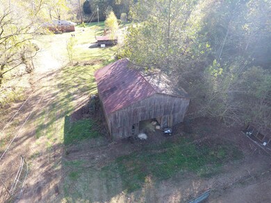 Aerial view of the large barn that could be used for any livestock, equipment storage, party venue, or place to explore hobbies.