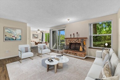 The slider leads out to the patio & grounds. Virtually staged.