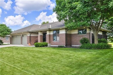 Custom Prairie Style Craftsman with lush landscapi