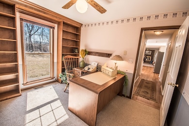 Quite first floor den . Great space to enjoy. Look