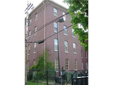 Exterior Back. Unit 2A is on the 2nd floor rear, e