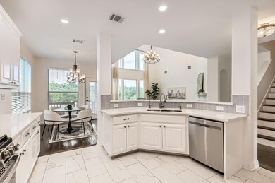 Kitchen featuring stainless steel appliances, a s