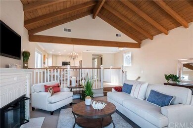 Living room opens from the dining kitchen area