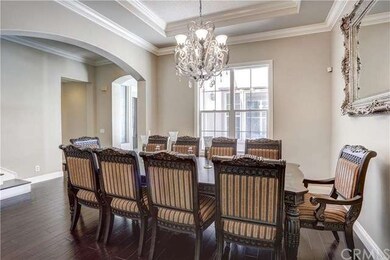 Luxurious formal dining room with room for 10-12. 