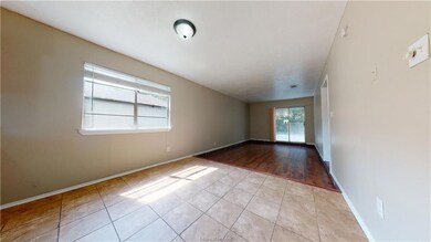 Spare room with light tile patterned floors