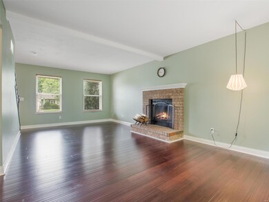Beautiful Large living room with Wood Burning fireplace.