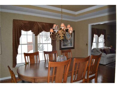 Dining Room. Formal dining room with hardwood floo