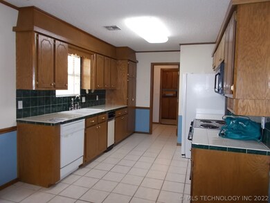 Galley type kitchen all appliances stay...