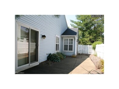 Fenced, side patio.