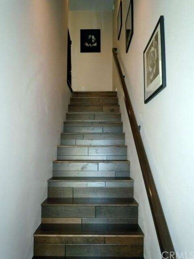 Stairs leading from first floor entry to second le