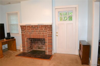 Living Room with Wood Burning Fireplace