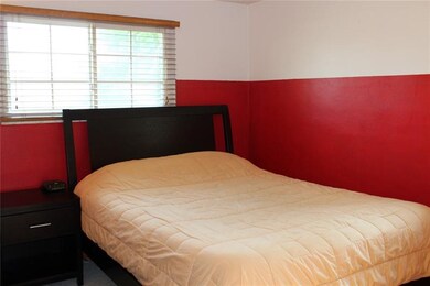 One of 4 bedrooms with large closets.