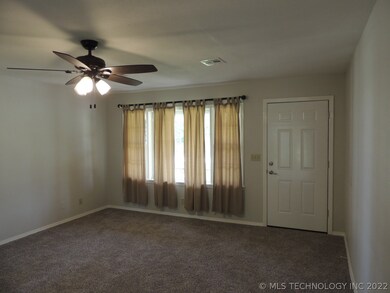 The front door opens to the family room with NEW c