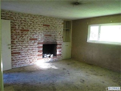 Other side of dual  fireplace in master bedroom.