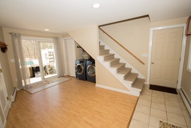 Enter through the mudroom door or drive right into
