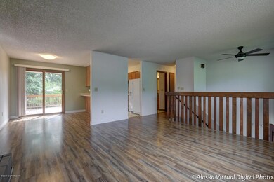 Living room open to dining room