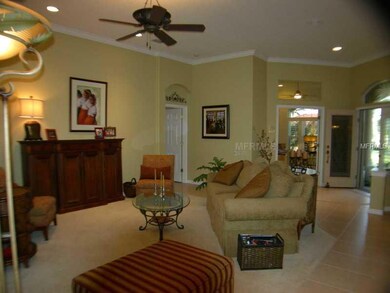 Living Room - View 2 of living room and French doors to office.