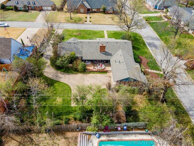 LARGE CORNER LOT AND BACK ENTRY GARAGE.  FRONT AND