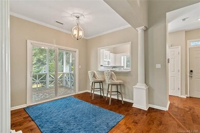 Breakfast bar in dining area! Hardwood floors throughout kitchen, dining and great room!