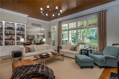 Family room - notice custom ceiling & built-in she