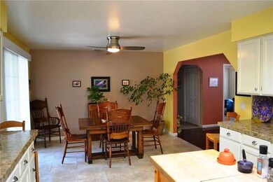 The open kitchen has a nice dining area attached, 