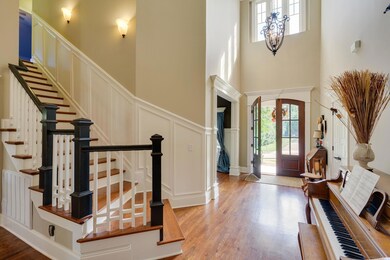 Pictured is the Grand Foyer with high ceilings and large windows for natural lighting.