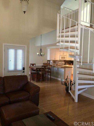 Contemporary spiral staircase that leads to one of