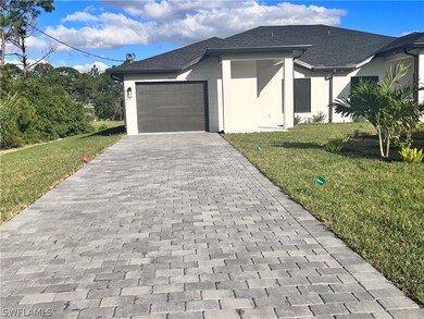 717 Eisenhower Blvd, Lehigh Acres, FL 33974 - photo 2