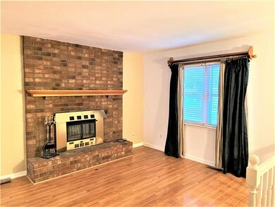 Front Room w/Wood Burning Fireplace w/Heat Recircu